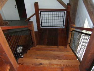 planks used as a stairway in renovated timber frame