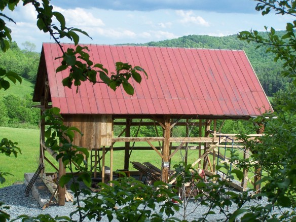 newly applied red roof historic wooden beams