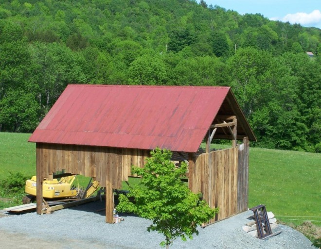 Pomfret restored barn frame with siding