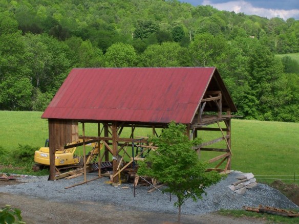 Restored barn home with red roof