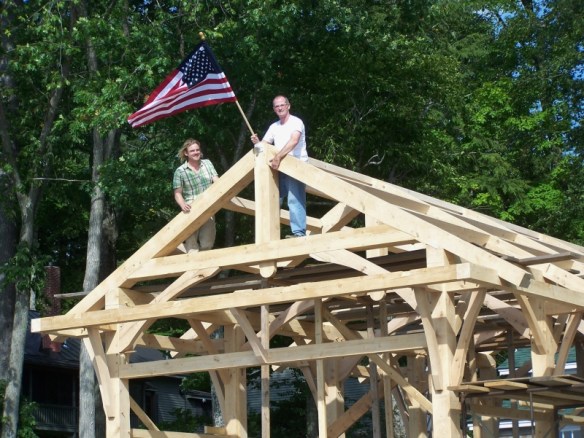 Flag Raising on boat house_Green Mountain Timber Frames_Luke Larson
