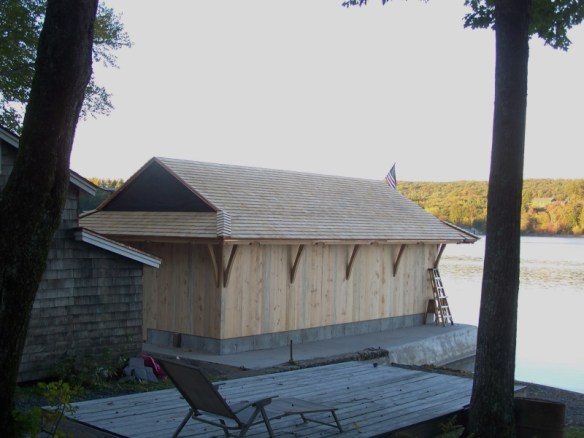 Custom Boat House_Boat house completed with siding_Green Mountain Timber Frames_Luke Larson