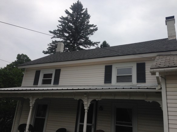 Restored slate roof by Green Mountain Timber Frames