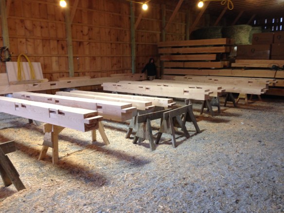 Post joinery is cut for timber frame