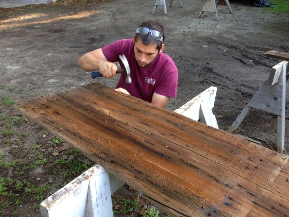 Removing nails to restore wooden timbers