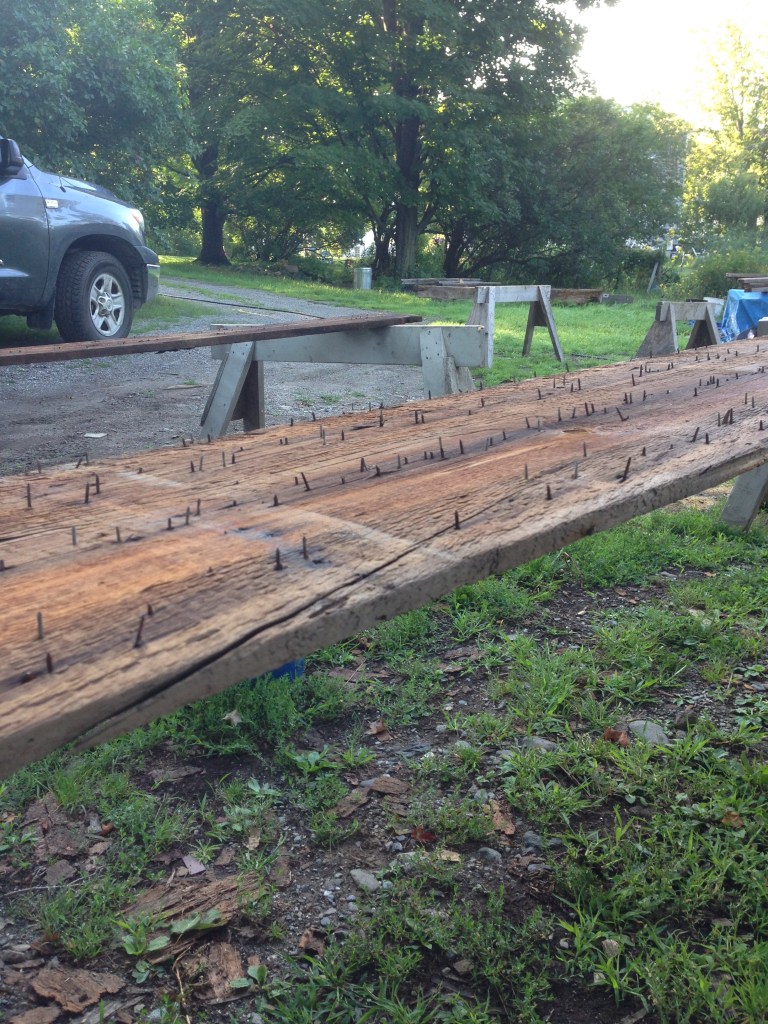 Removing nails to restore wooden beams