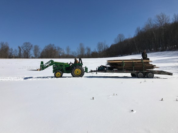 trapper cabin corn crib hauled through the fields for restoration green mountain timber frames