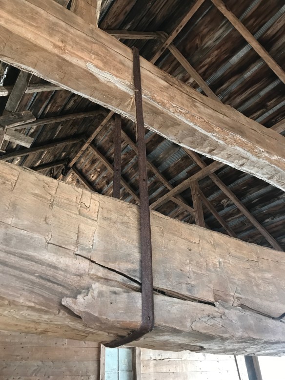 wagon wheel repair to chestnut timber | Green mountain timber frames