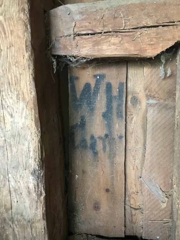 graffiti or initials in gunstock barn restored by green mountain