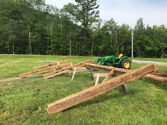 raising reclaimed wood from timber frame barn home in Vermont