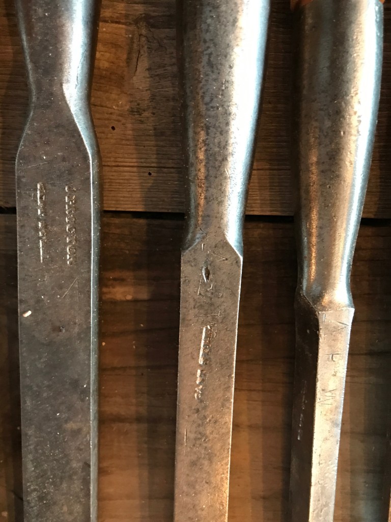 detail of vintage mortising chisels hand stamped