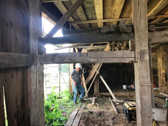 Interior taking down Galway Barn Green Mountain Timber Frames